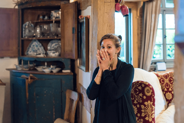Shirley reacting with joy while getting ready for the wedding